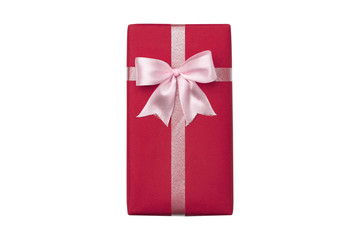 Red gift box, pink bow on white background top viwe.