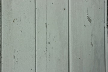 Peeling paint on the old wooden floor