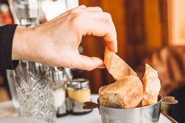 Fresh crisp bread in a basket in a restaurant for lunch