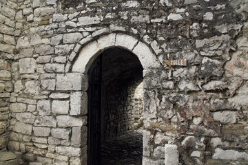 Fototapeta na wymiar Toilet sign at Berat castle