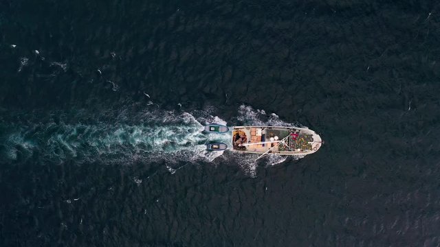 Aerial view of fishing boat sailing at Adriatic sea, Rijeka, Croatia.