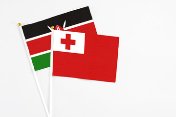 Tonga and Kenya stick flags on white background. High quality fabric, miniature national flag....