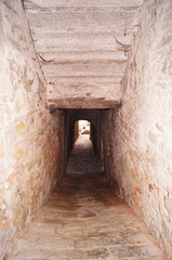 Typical gallery in the historic center of Poppi, Tuscany, Italy
