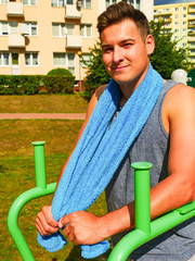Young man relaxing after outdoor workout