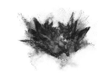 particles of charcoal on white background,abstract powder splatted on white background,Freeze...