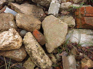the old broken Foundation of the house of bricks and concrete
