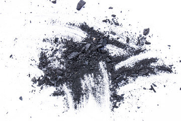 Black coal dust powder isolated on a white background