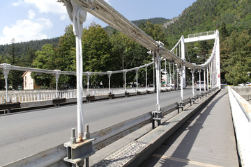 Fototapeta na wymiar Borjomi bridge of the beauty leads to the historic mineral water park