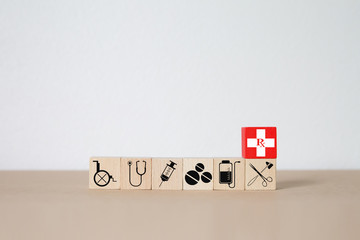 Medical and Health on wood block concept.