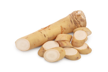 Horseradish root with slices isolated on white background
