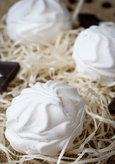 Obraz na płótnie Canvas Zephyr, Zefir, Marshmallow, white zefir with wooden hair and chocolade