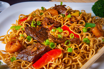 Fried Mie noodles with beef and vegetables.