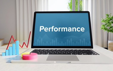 Performance – Statistics/Business. Laptop in the office with term on the Screen. Finance/Economy.