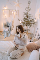 Naklejka premium Beautiful brunet model posing in the studio. Delicate style feminine.