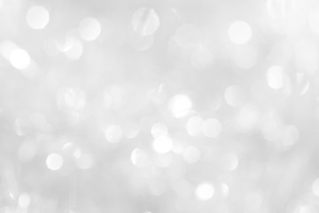 A brilliant blurry white background for a festive mood. Template for greeting card for entertainment.