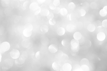 A brilliant blurry white background for a festive mood. Template for greeting card for entertainment.
