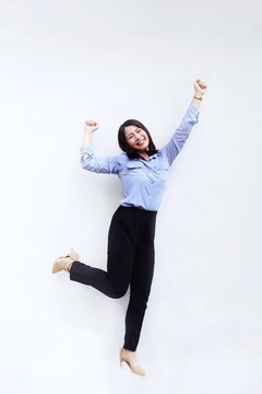 Business Woman Jumping With Joy