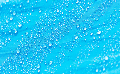 Raindrops on a tent as an abstract background