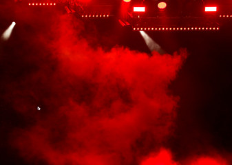 Red light on a rock concert stage as background