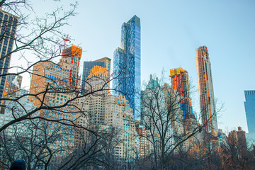 Ice skaters having fun in New York Central Park in winter