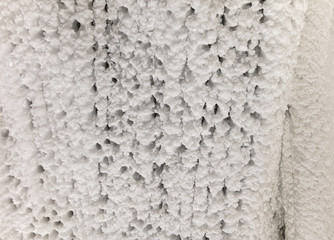 White walls of ice and snow in a cave