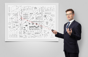 Professor with laser pointer teaching business theories