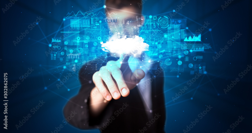 Aufkleber Man touching hologram projection displaying information from cloud based system