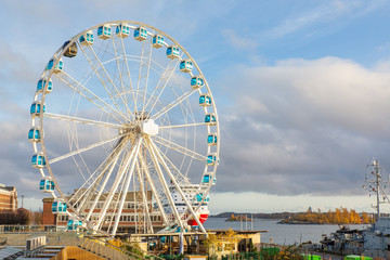 Finnish urban landscape with ferris wheel in Helsinki
