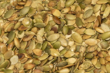 Pumpkin seeds background fried peeled green lot