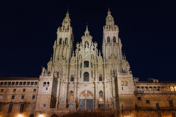Santiago de Compostela, Spain - 10/18/2018: Cathedral of Saint James with illumination on dark sky in Santiago de Compostela. Cathedral on Camino de Santiago in the night. 