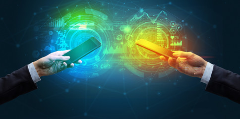 Close up of two smartphones, business and communication concept