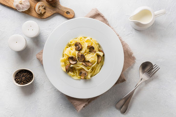 Spaghetti reginelle pasta with mushrooms. Tasty healthy dinner.. Top view.