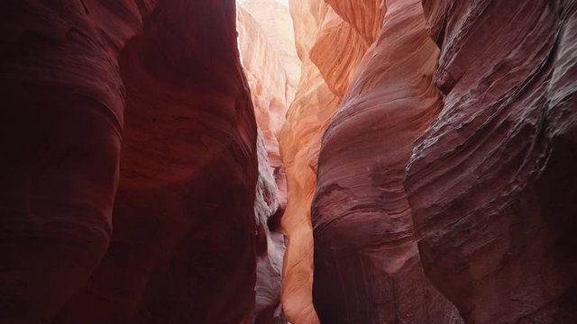 Buckskin Gulch Deep Slot Canyon With Wavy And Smooth Orange Red Rock Walls