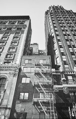 Old brick building with fire escape, New York, USA.