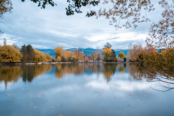 lake of Puigcerda AND SCHIERBECK PARK, town in Girona, Catalonia, in the midst of gardens rich in willows, conifers and other essences, the shores of this man-made lake are lined in pretty villas