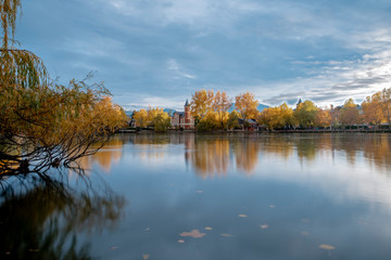 lake of Puigcerda AND SCHIERBECK PARK, town in Girona, Catalonia, in the midst of gardens rich in willows, conifers and other essences, the shores of this man-made lake are lined in pretty villas