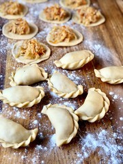 the process of making homemade dumplings with cabbage