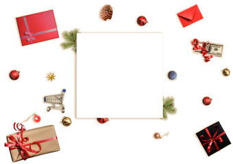 Christmas composition. Paper blank, christmas tree branches, golden decorations on white background. Flat lay, top view, copy space, square.