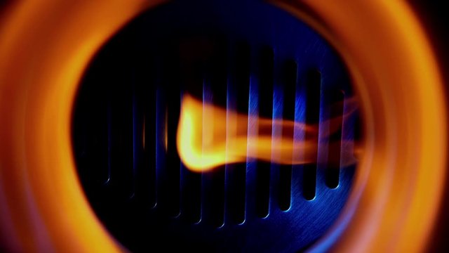 Ignition of gas in the thermal equipment. Close-up view.