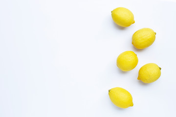 Lemons on white background. Top view