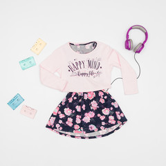 Fashion clothes - set dress and sports jacket for girls; photo in neutral background.