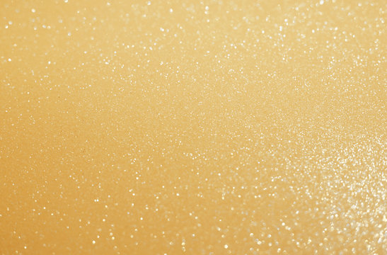 Gold defocused glitter background for Christmas card design