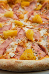 Macro photo of pizza with chicken ham and pineapple