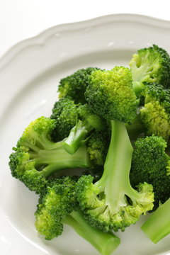 boiled broccoli on dish for healthy Chinese food image