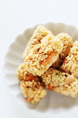 Asian confectionery, rice cracker on dish with copy space