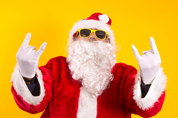 Santa Claus making negative gesture against Christmas with index finger