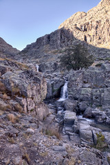 small waterfall of a mountain river