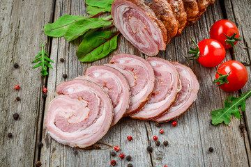 Veal roll filled with minced beef meat and herbs