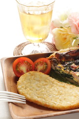 Hash brown on wooden plate for breakfast image