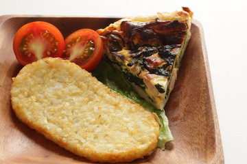 Hash brown on wooden plate for breakfast image